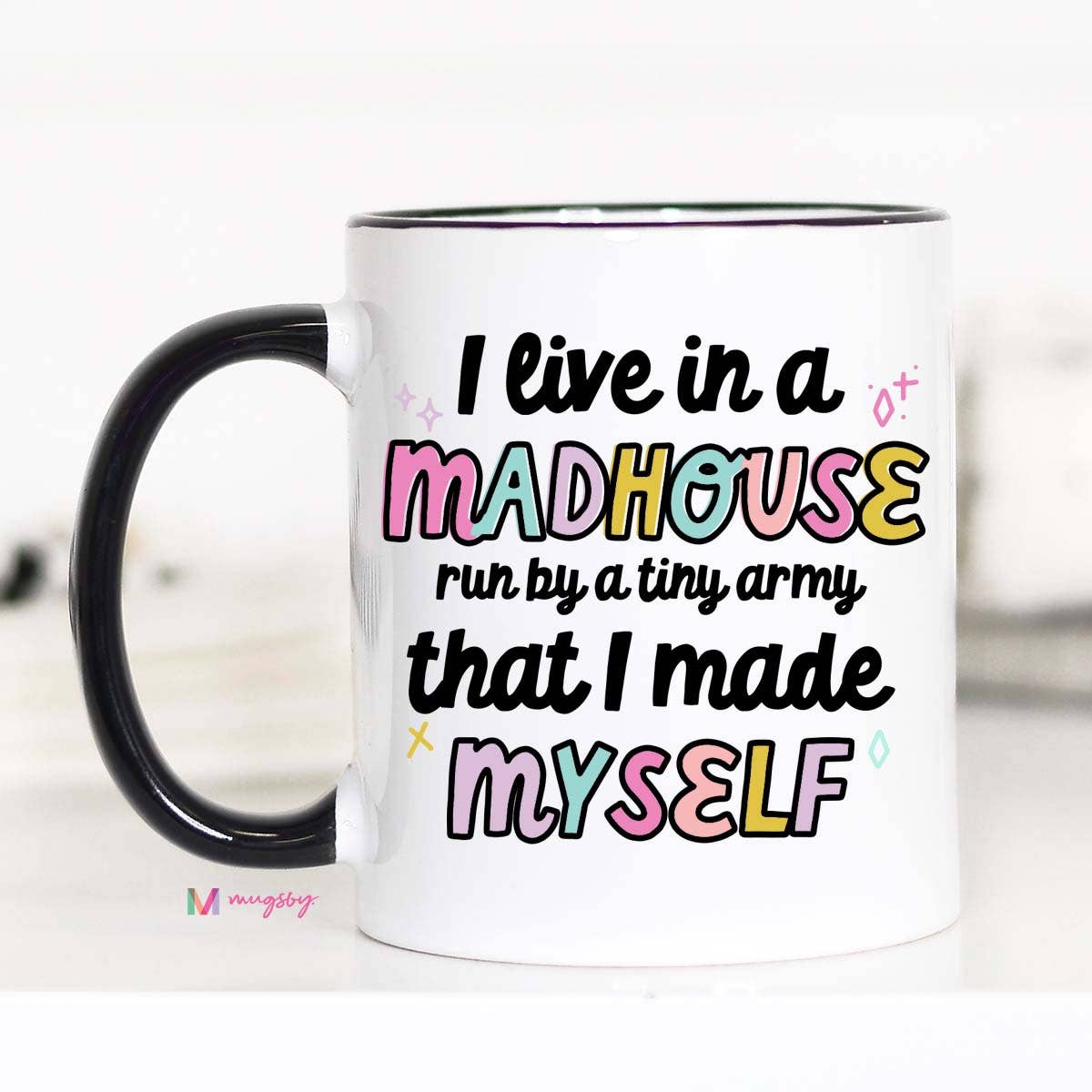 I Live in a Madhouse Coffee Mug